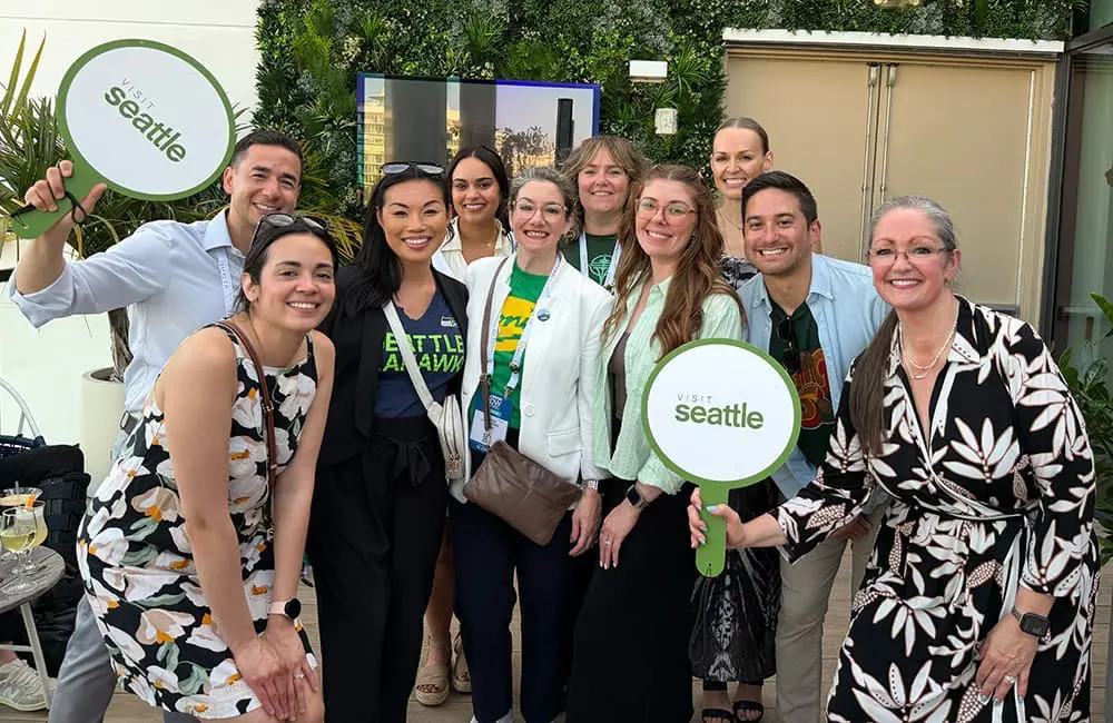 Visit Seattle team at the Fans of Seattle celebration at IPW 2026. Image: Cassie Tannenberg