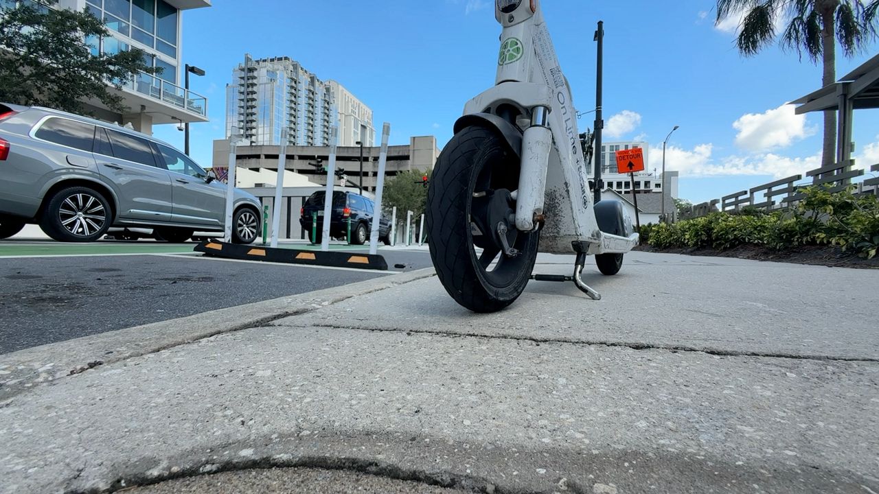 Shared e-bikes and e-scooters can be seen all over downtown Orlando, which is why city leaders are considering, among other things, plans to better address parking them. (Spectrum News)