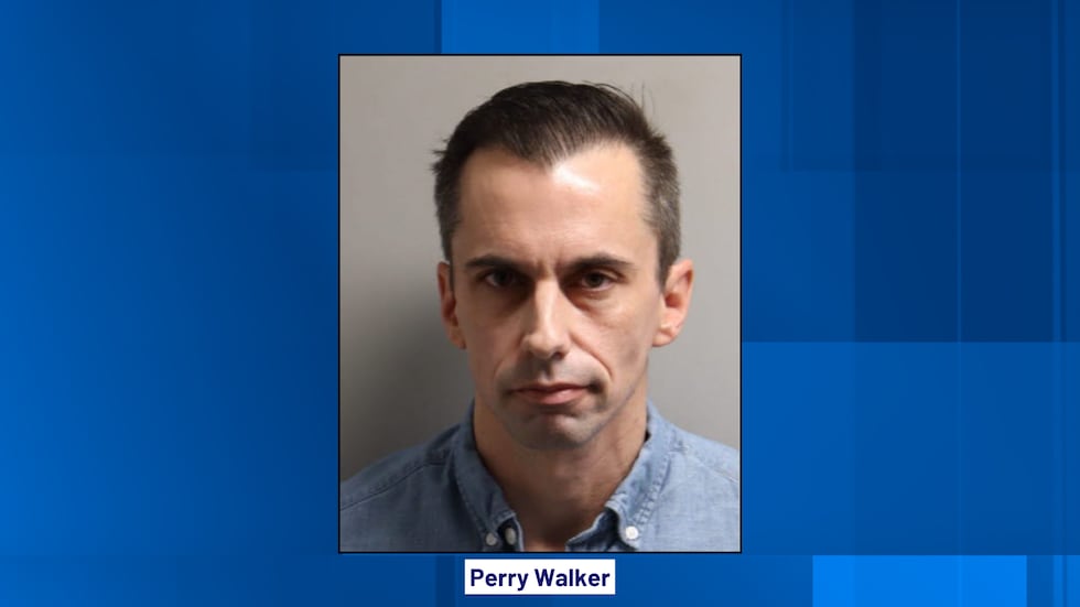 Perry Walker was arrested on child porn charges, according to LCSO.