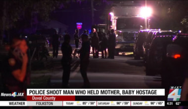 Man shot by officers after alleged hostage situation involving woman, infant, according to JSO