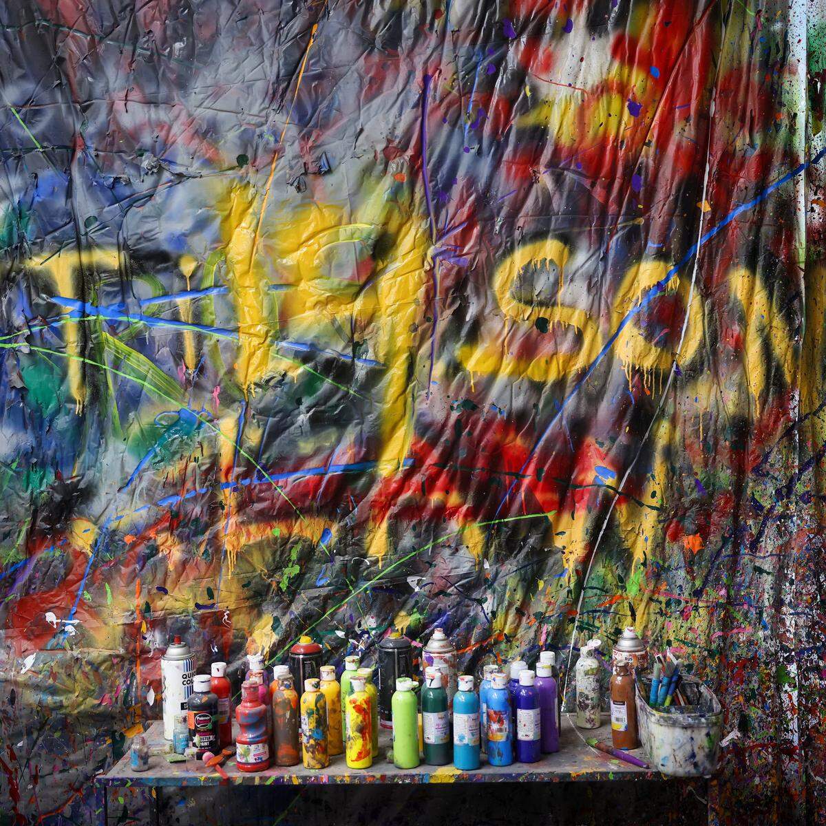 Patrons use colorful paint to express themselves on the canvases, large and small, of the splatter room at Break Room Miami, Thursday, May 7, 2026, in Miami. The creative activity offers a safe, unconventional outlet for stress.
