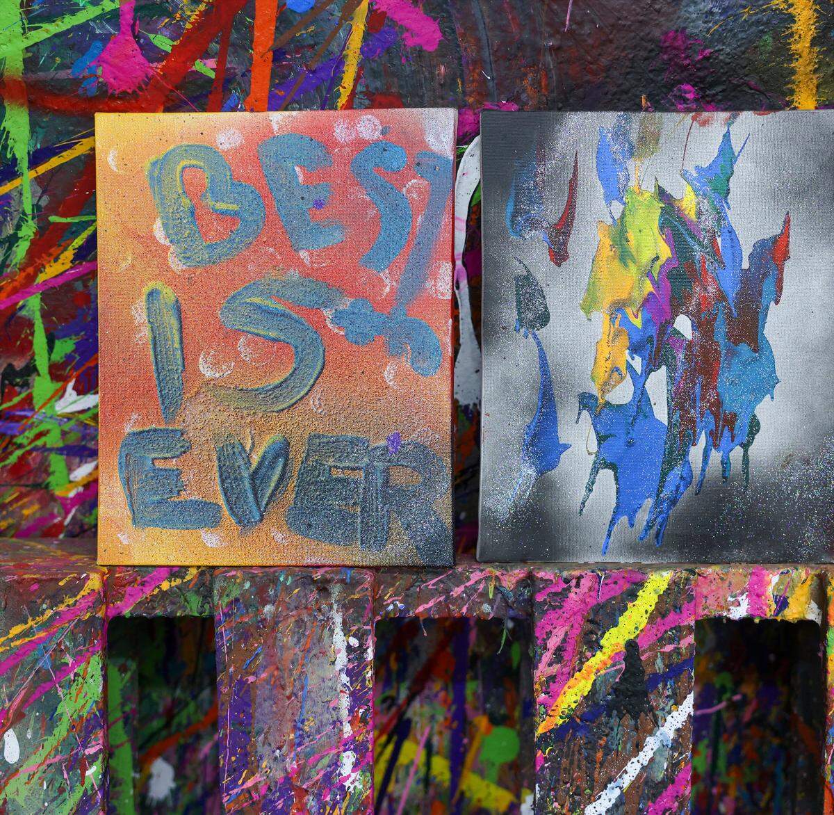 Patrons use colorful paint to express themselves on the canvases, large and small, of the splatter room at Break Room Miami, Thursday, May 7, 2026, in Miami. The creative activity offers a safe, unconventional outlet for stress.