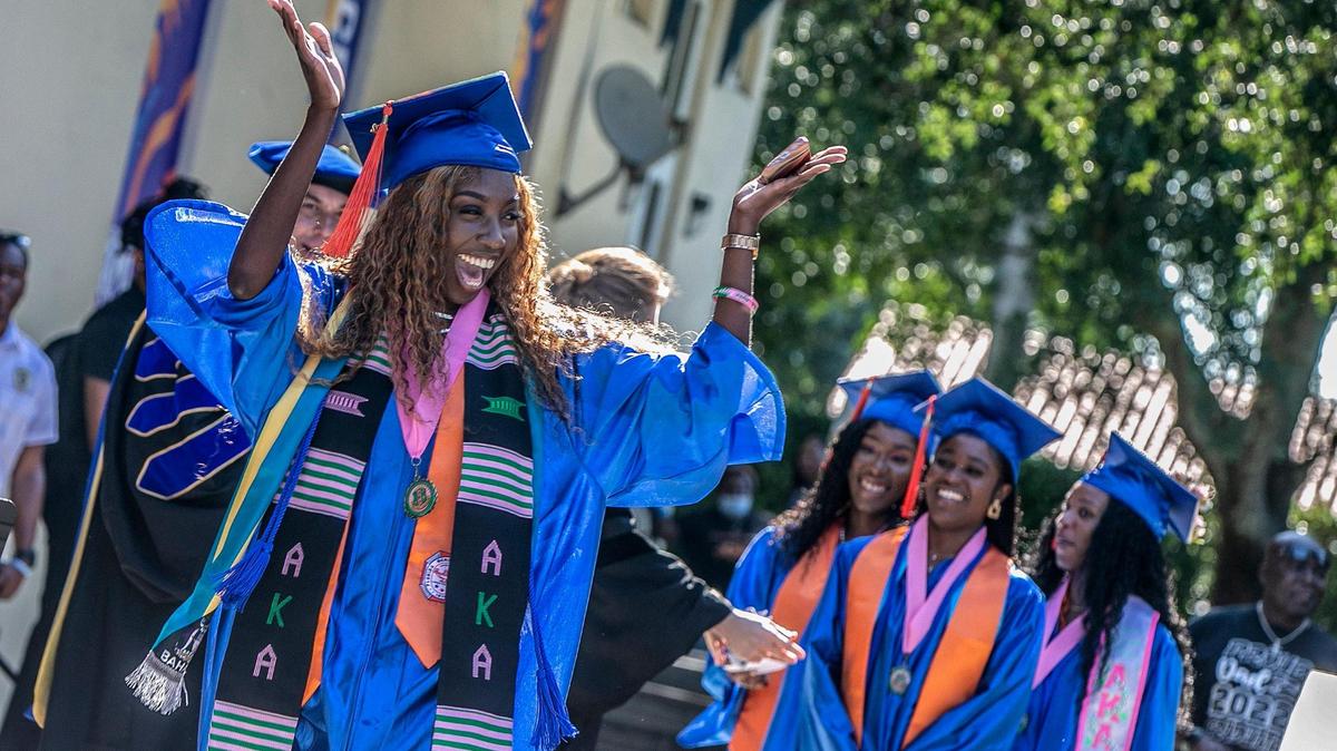 Student Creanne Alicia Butler reacts as she graduates with a degree in aeronautical science, during the spring 2022 commencement ceremony at Florida Memorial University in Miami Gardens in 2022. Student Creanne Alicia Butler reacts as she graduates with a degree in aeronautical science, during the spring 2022 commencement ceremony at Florida Memorial University in Miami Gardens in 2022.