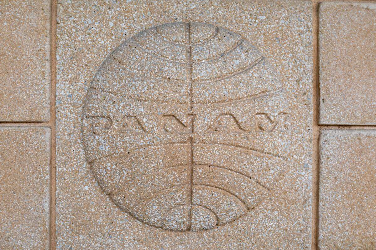 A look an original Pan Am logo on the facade inside Miami International Airport’s new private terminal on Wednesday, July 23, 2025, in Miami, Fla.