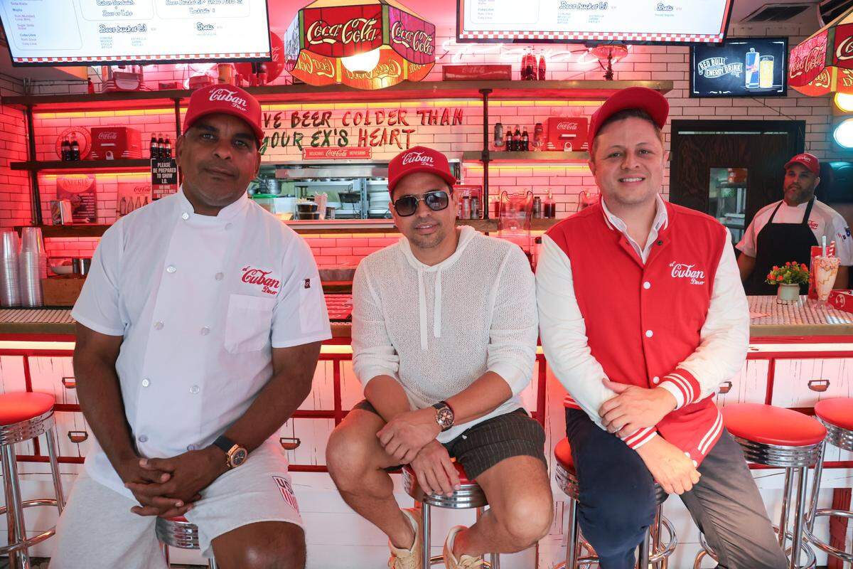 GastronomicaMiami Executive Board members Eliesteban Mena, left, Oscar Rodriguez, center, and Earl J Campos de Vine, right, get their picture taken inside their restaurant, El Cuban Diner, located at 1620 SW Eighth St., in Miami, Fla., on Tuesday, Nov. 4, 2025.