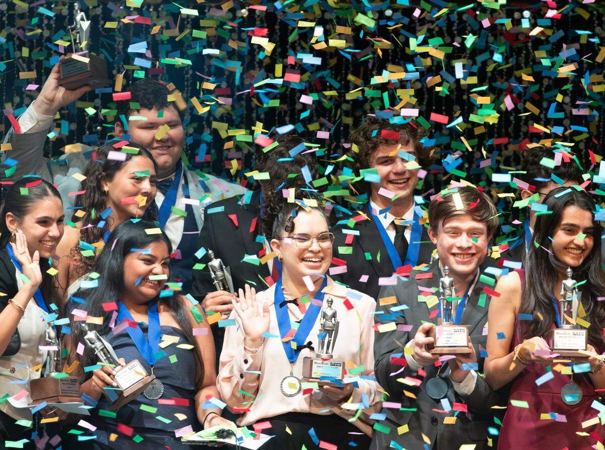 Silver Knight winners celebrate during the Miami Herald & el Nuevo Herald 67th Silver Knight Award Ceremony at the James L. Knight Center on Wednesday, May 14, 2025, in downtown Miami, Fla.