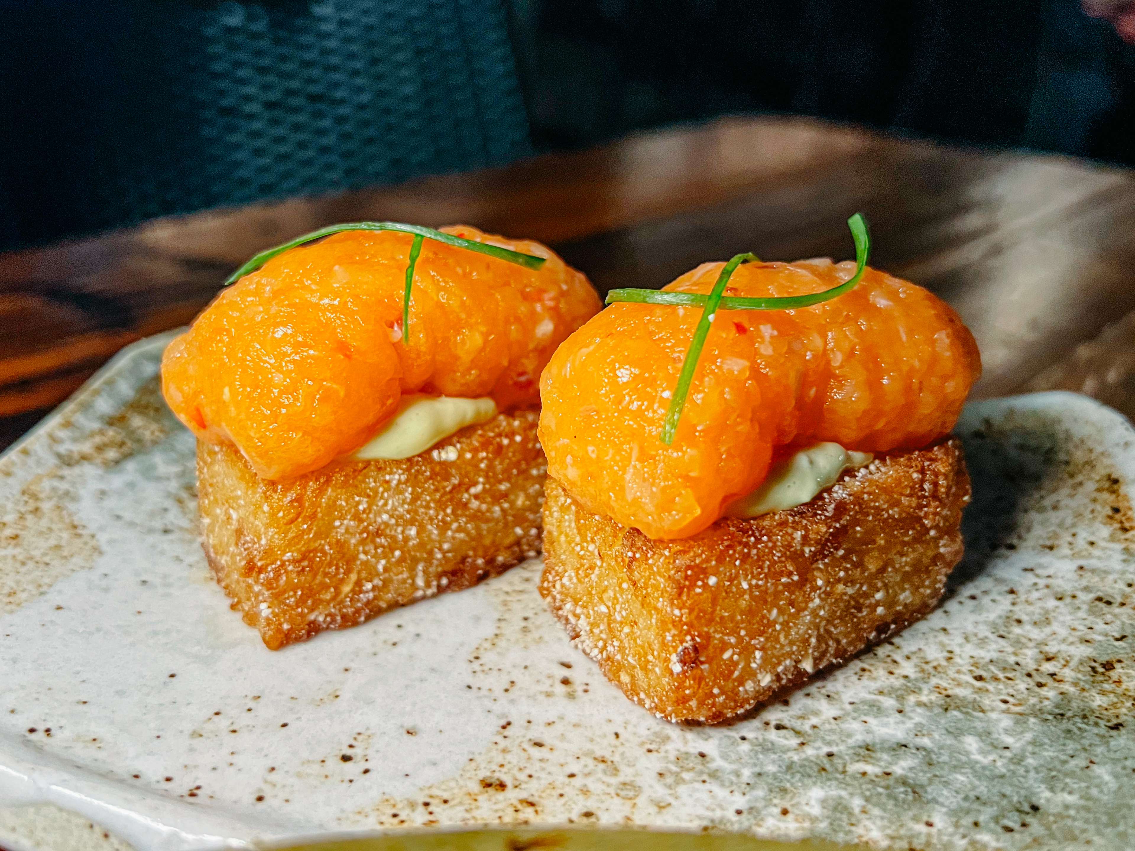 Two pieces of crispy rice.
