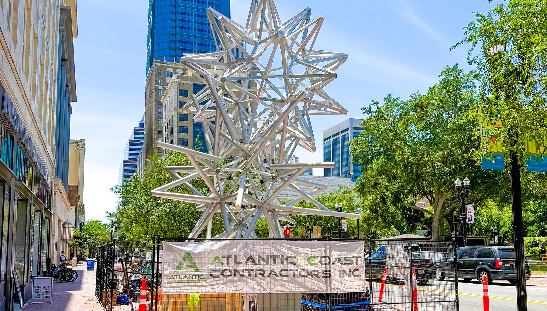 Construction crews are working to install “Jacksonville Stacked Stars” on the Laura Street sidewalk in front of MOCA in Downtown Jacksonville.