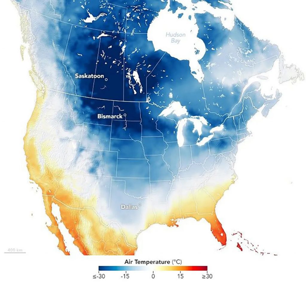 Map of North America showing air temperatures, with cold blues across Canada and the northern U.S. and warmer yellows, oranges, and reds in the southern U.S. and Mexico.