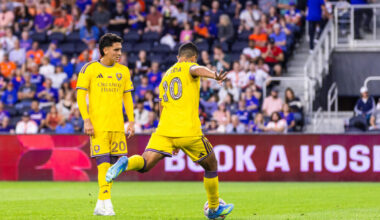 Image of Martin Ojeda taking a free kick against FC Cincinnati as Eduard Atuesta looks on.