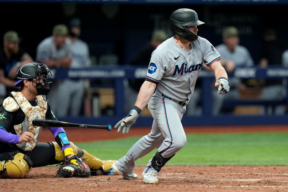 Miami Marlins' Liam Hicks watches his two-run single off Tampa Bay Rays pitcher Hunter Bigge during the 10th inning of a baseball game Saturday, May 16, 2026, in St. Petersburg, Fla. (AP Photo/Chris O'Meara)