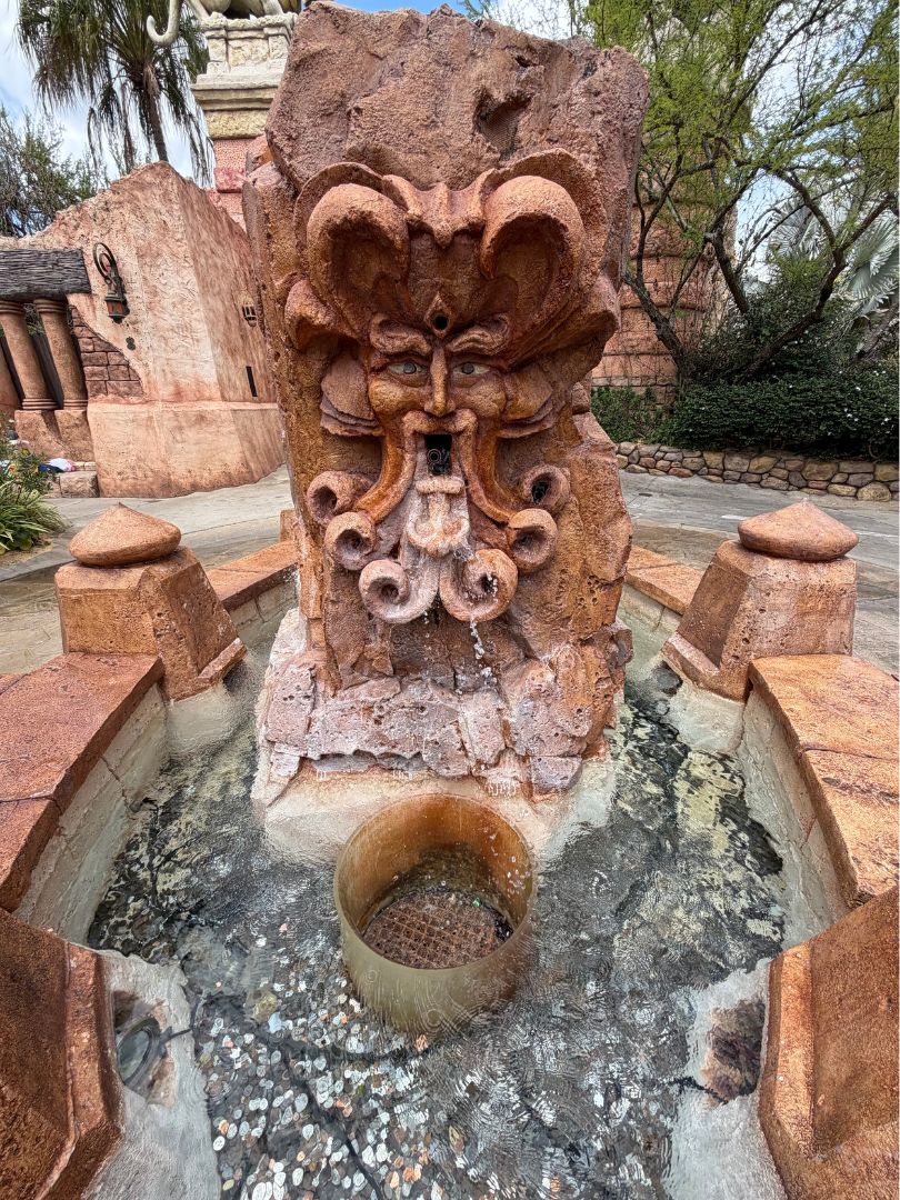 Mystic Fountain at Islands of Adventure with coins