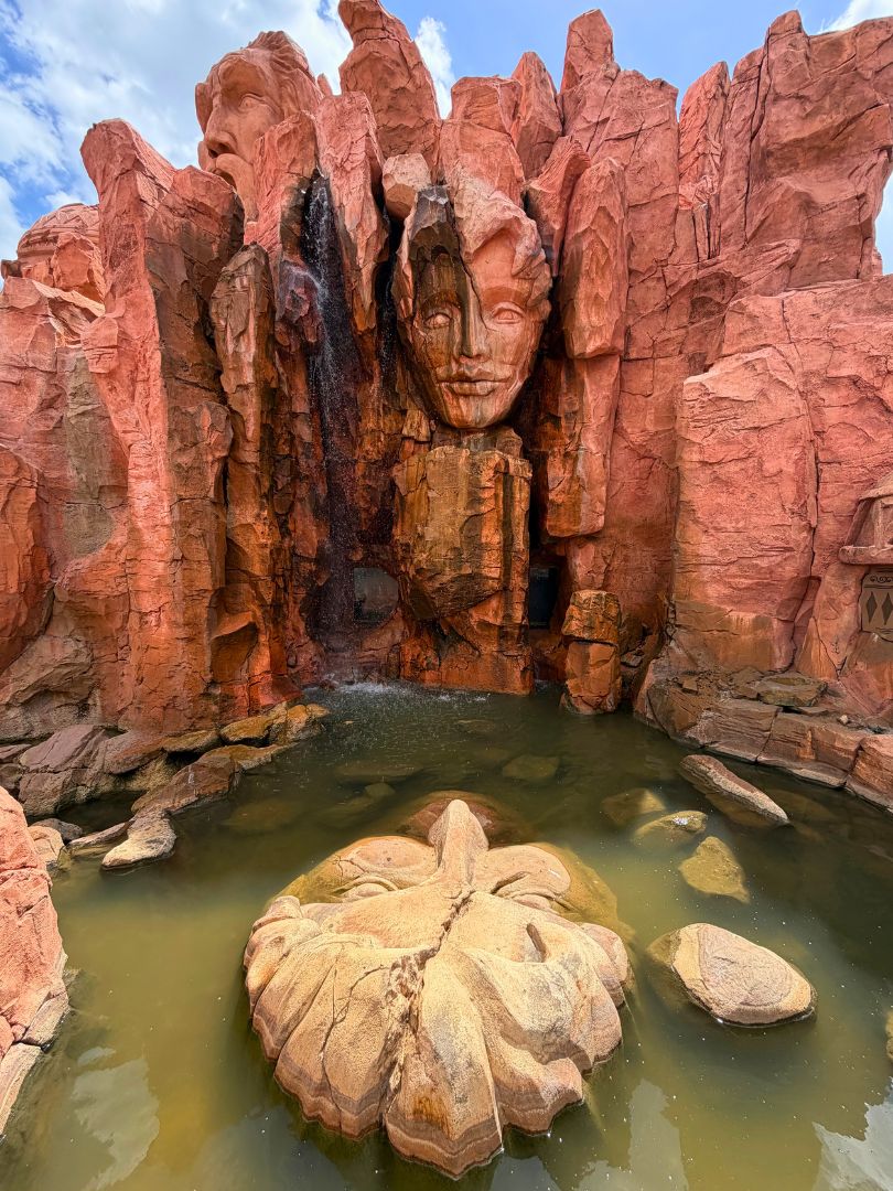 Mythos waterfall over lagoon