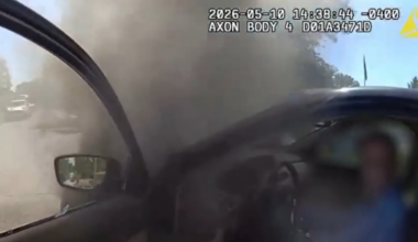 Miami Township officer rescues man from burning car