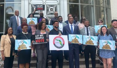 The Orange County Black Democratic Caucus holds a press conference Tuesday to address their dismay with a new congressional map signed into law by Gov. Ron DeSantis. (Spectrum News/Brandon Spencer)