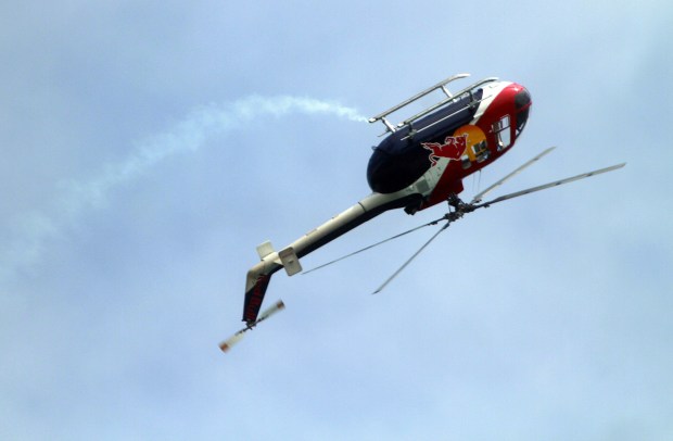 The Red Bull Helicopter flies upside-down during the 2018 during the 2018 Fort Lauderdale Air Show.