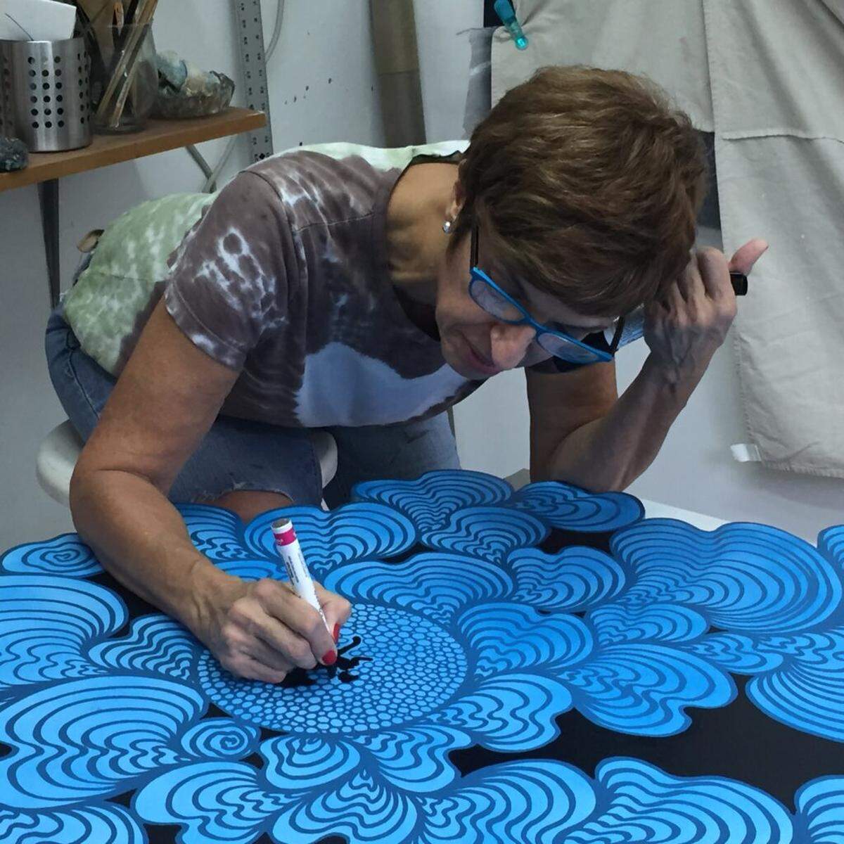 Luisa Mesa at work in her studio, where her compositions develop through an intuitive process guided by color and form.