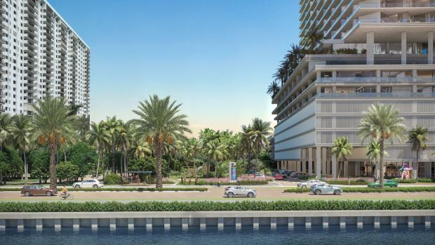 An artist's rendering shows a luxury condo tower with workforce housing apartments planned on public land at 1301 South Ocean Drive, now home to a community center and Harry Berry Park in Hollywood. (SOM/CFE/ARX, Courtesy) 
