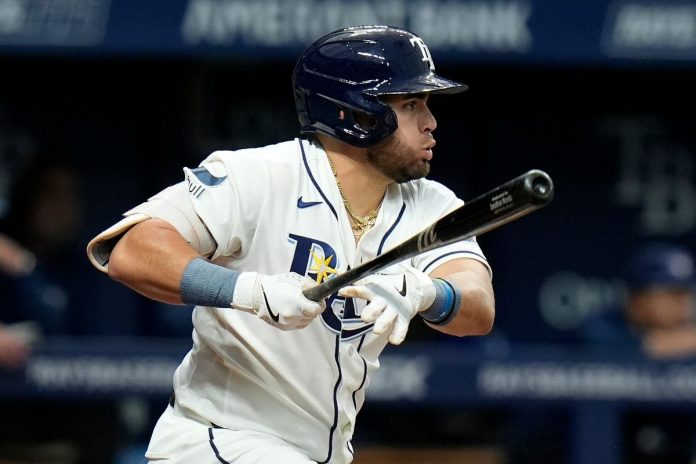 Tampa Bay Rays' Jonathan Aranda watches his RBI single off Toronto Blue Jays pitcher Kevin Gausman during the third inning of a baseball game Tuesday, May 5, 2026, in St. Petersburg, Fla. (AP Photo/Chris O'Meara)