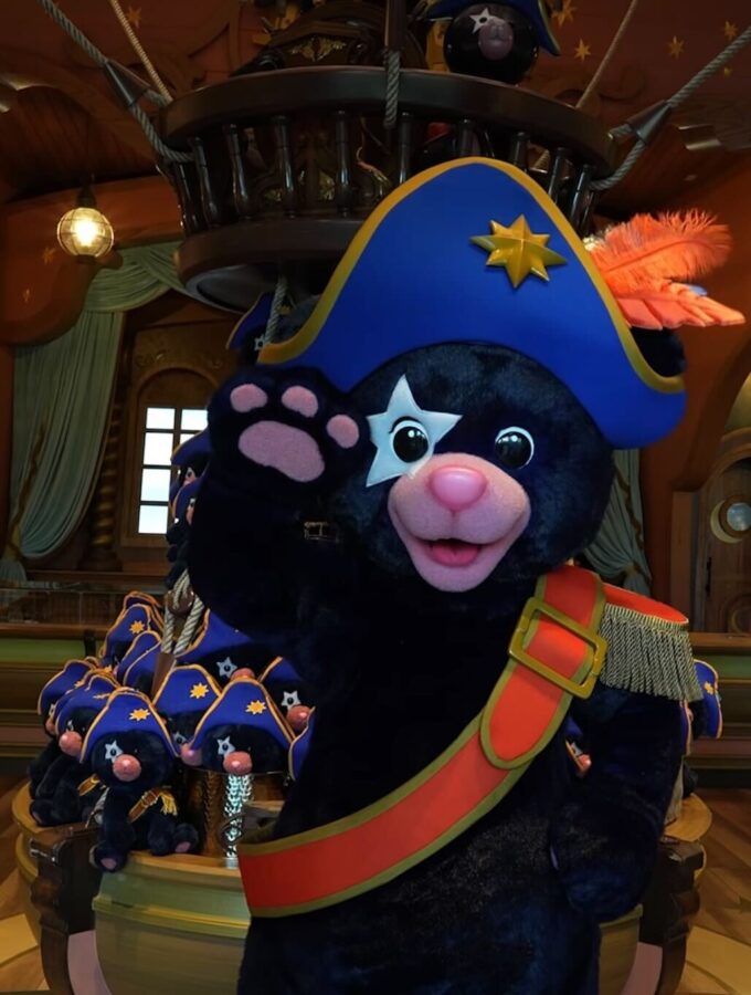 Screenshot of Captain Cacao character greeting in Epic Universe shop - image from Universal Orlando wave