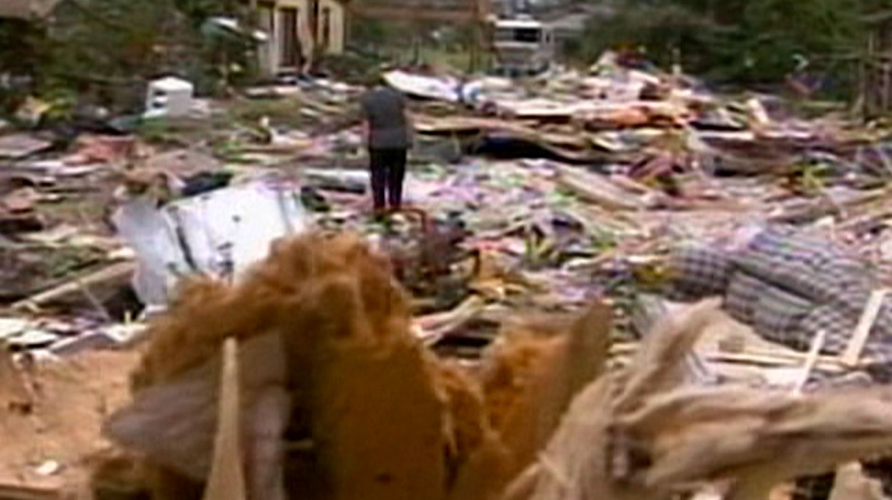 Person examines damage and debris after Hurricane Charley slammed into Florida in August 2004. (File)