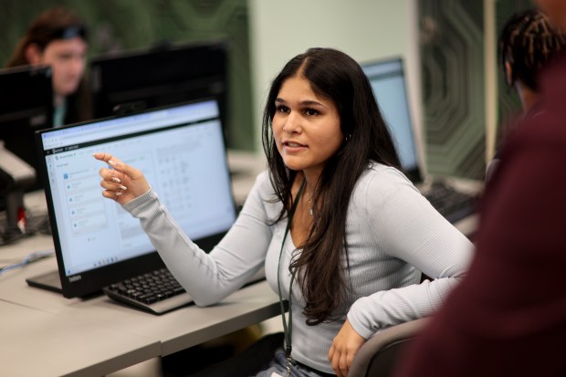 Sofia Mazumdar discusses her work in class at Nova High School on Thursday, May 21, 2026. Students in the class are using tools like Microsoft Copilot Studio and technologies powered by Azure OpenAI and Claude services to build intelligent chatbot agents so users can figure out how to report an absence, sign up for clubs and athletics, or determine exactly what's needed to graduate. (Mike Stocker/South Florida Sun Sentinel)