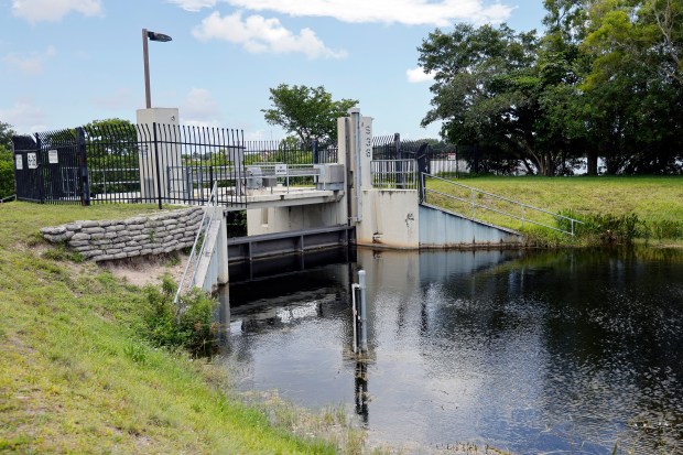 S-36 Spillway is shown along the Middle River Canal at the Northwest corner of Blue Heron Lake and south side of Emerald Lake in Oakland Park on Thursday, May 21, 2026. (Amy Beth Bennett / South Florida Sun Sentinel)