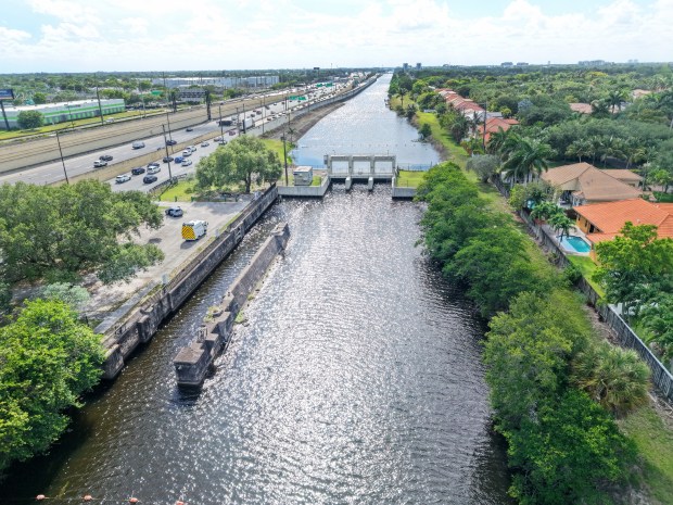The G-54 gated spillway at the Sewell Lock between Plantation and Davie is seen on Wednesday, May 20, 2026. (Carline Jean/South Florida Sun Sentinel)