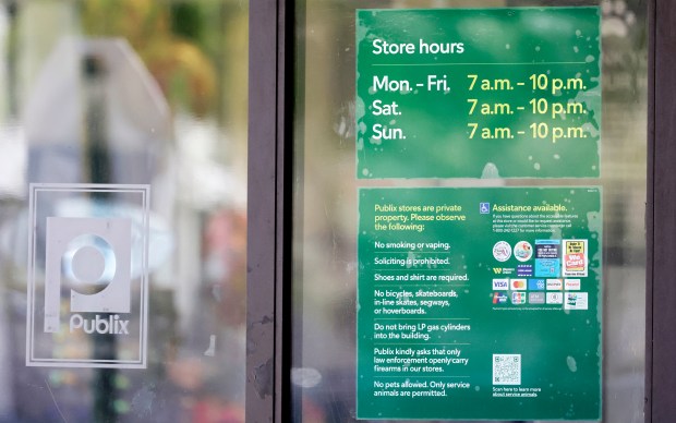 Publix stores across Florida, including in South Florida, display signs that ask only law enforcement openly carry guns in stores. The sign is seen at a Publix in Deerfield Beach on Thursday, May 7, 2026. (Carline Jean/South Florida Sun Sentinel)