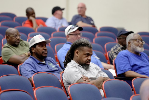 Audience members listen as Dan Reynolds, president of the Federation of Public Employees, speaks to the Broward County School Board during a meeting at Plantation High School on Thursday, May 21, 2026, to discuss employee's pay and benefits. (Mike Stocker/South Florida Sun Sentinel)