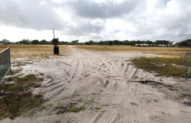 An empty lot south of Chase Stadium, shown on Dec. 17, 2024, will one day be one of Fort Lauderdale's signature parks. But so far, it has yet to break ground. (Carline Jean/South Florida Sun Sentinel)