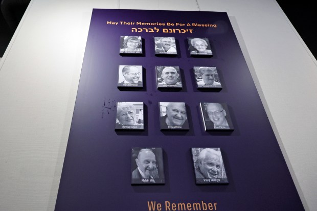 A remembrance wall with photos of the 11 people who died in the Tree of Life Synagogue shootings is shown at the Alvin Sherman Library at Nova Southeastern University in Davie on Monday, May 11, 2026. This during a media preview of an upcoming exhibit, "Lessons from the Tree of Life: Lighting the Path Forward" which explores antisemitism in America, the Pittsburgh synagogue shootings in 2018, and the path forward since.(Amy Beth Bennett / Sun Sentinel)