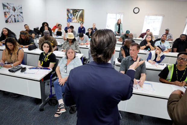 Laid-off Spirit Airlines workers attend a presentation on career and employment resources at CareerSource (cq) Broward in Hollywood on Monday, May 5, 2026. Displaced workers from the airline will receive resume assistance, job search assistance, career counseling and access to training. (Amy Beth Bennett / South Florida Sun Sentinel)
