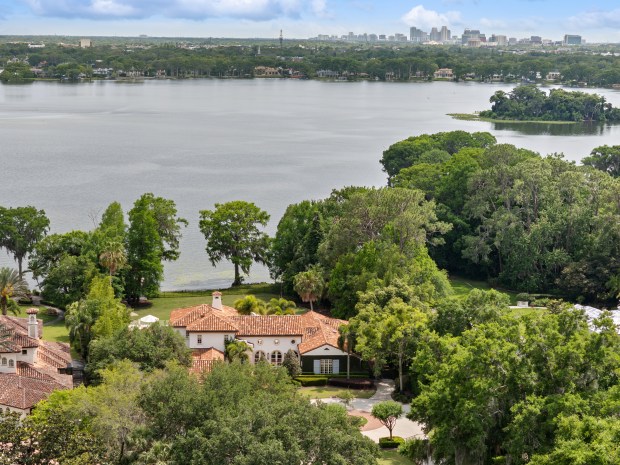 With a south-facing view of Lake Maitland, the owners can see clearly through to downtown Orlando. (Courtesy of Uneek Image)