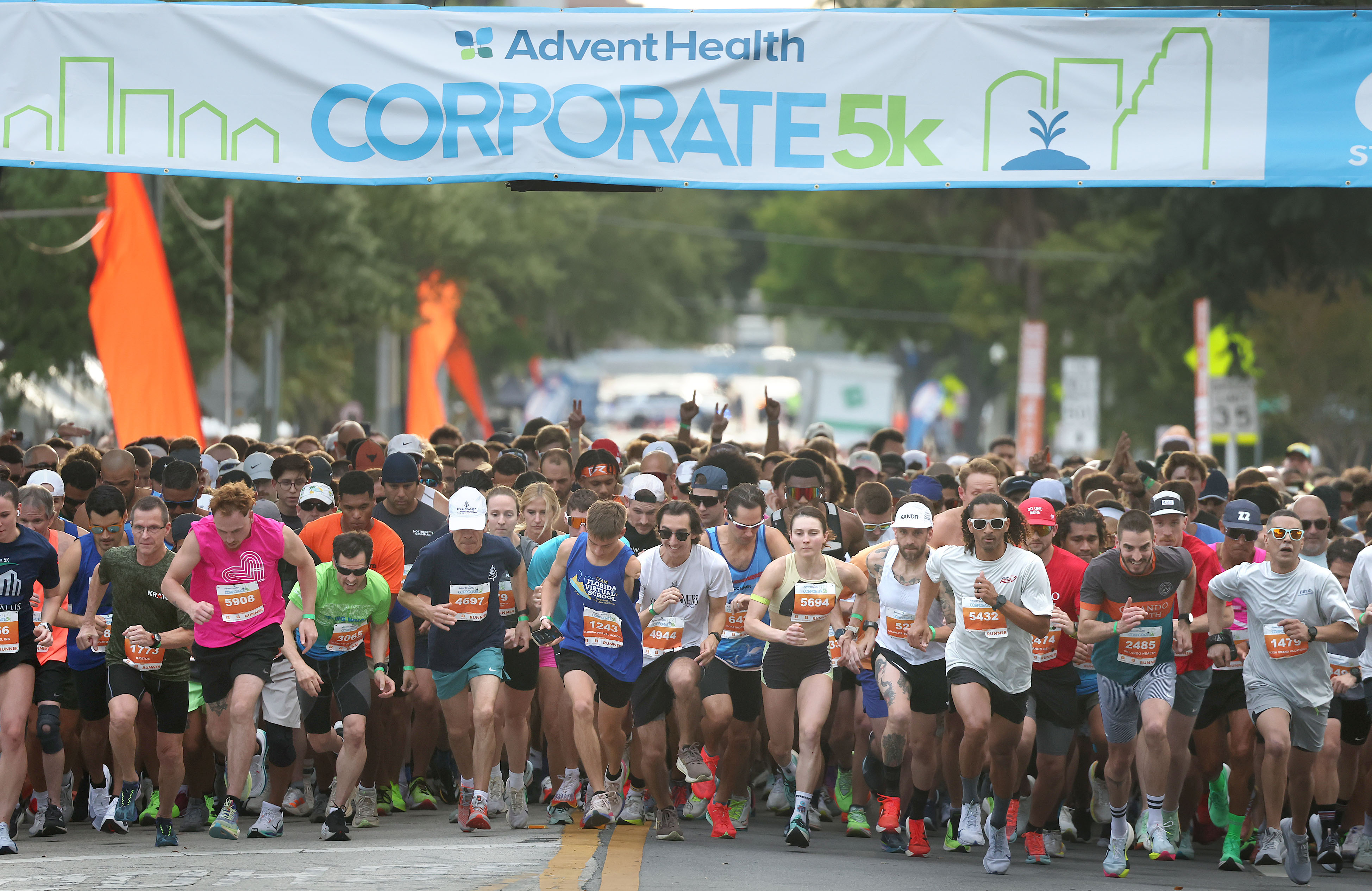 Runners take off during the 32nd AdventHealth Corporate 5K in...