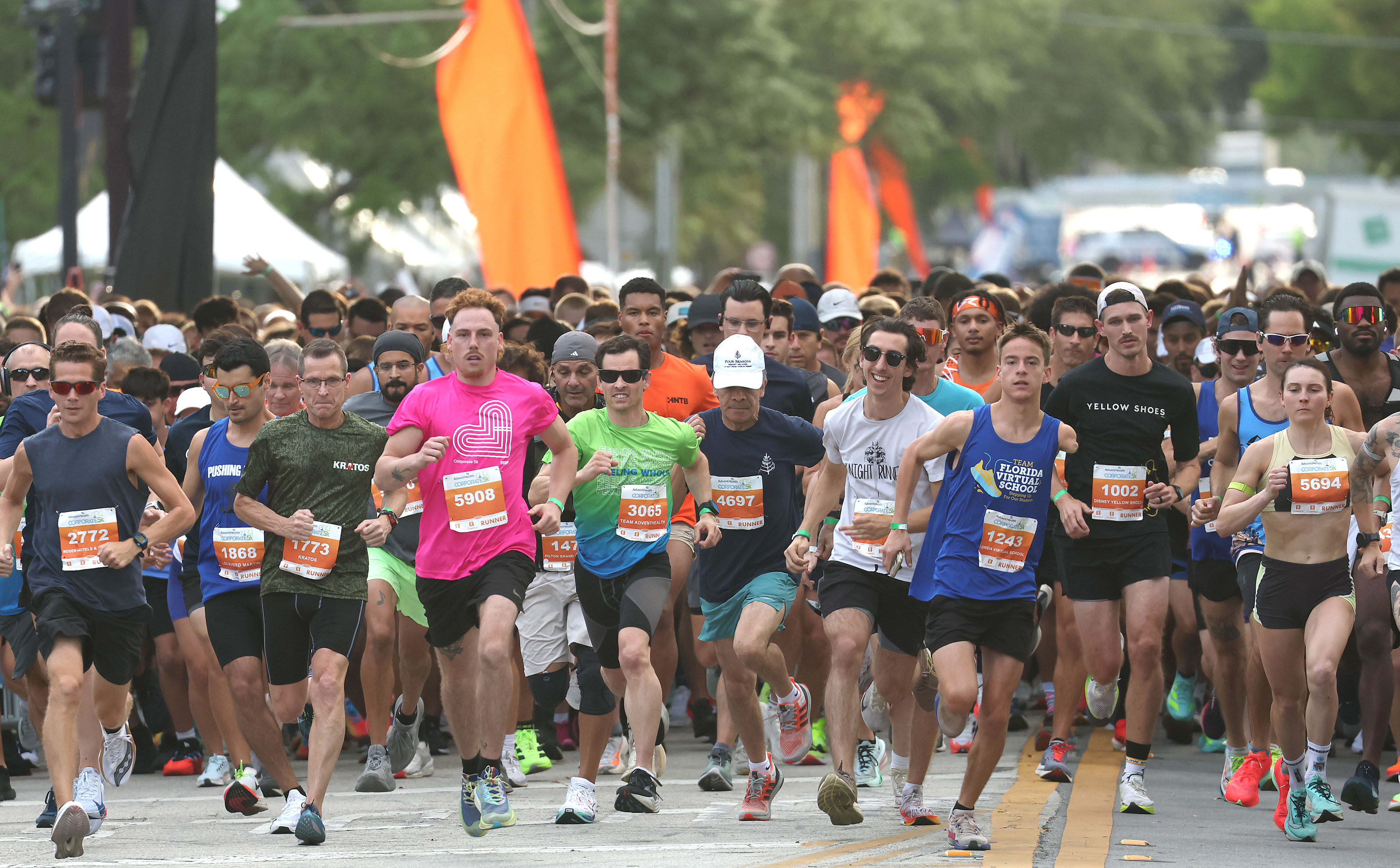 Runners take off during the 32nd AdventHealth Corporate 5K in...