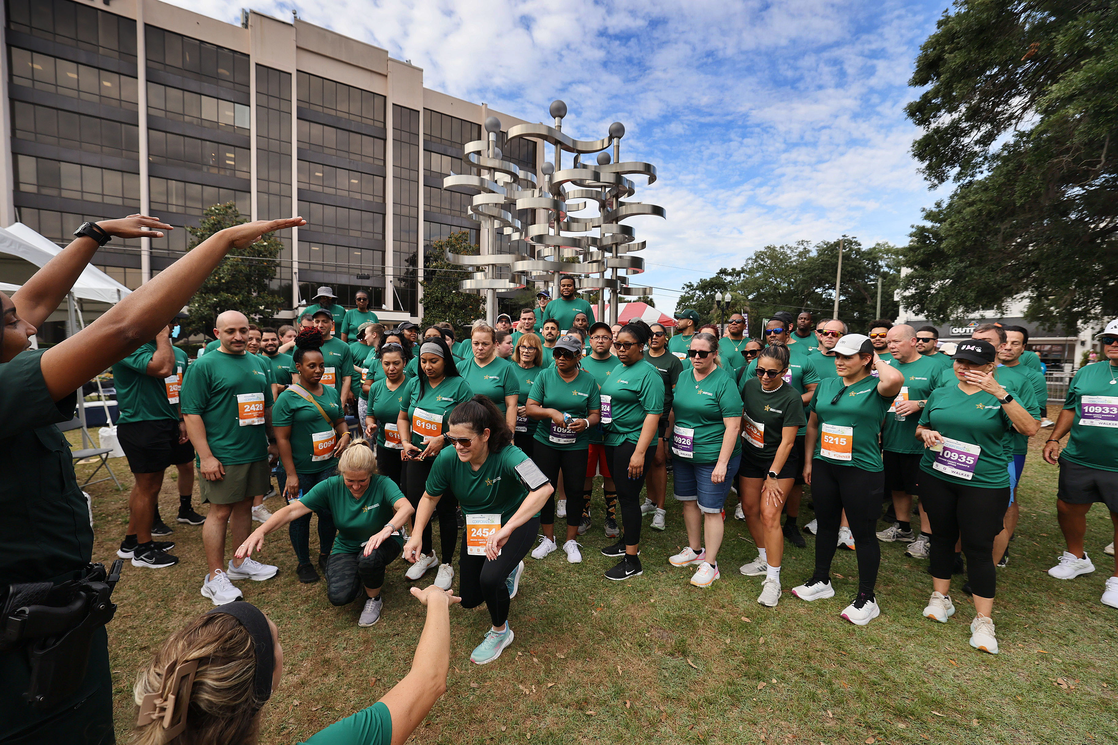 Orange County Sheriff's employees gather before the 32nd AdventHealth Corporate...