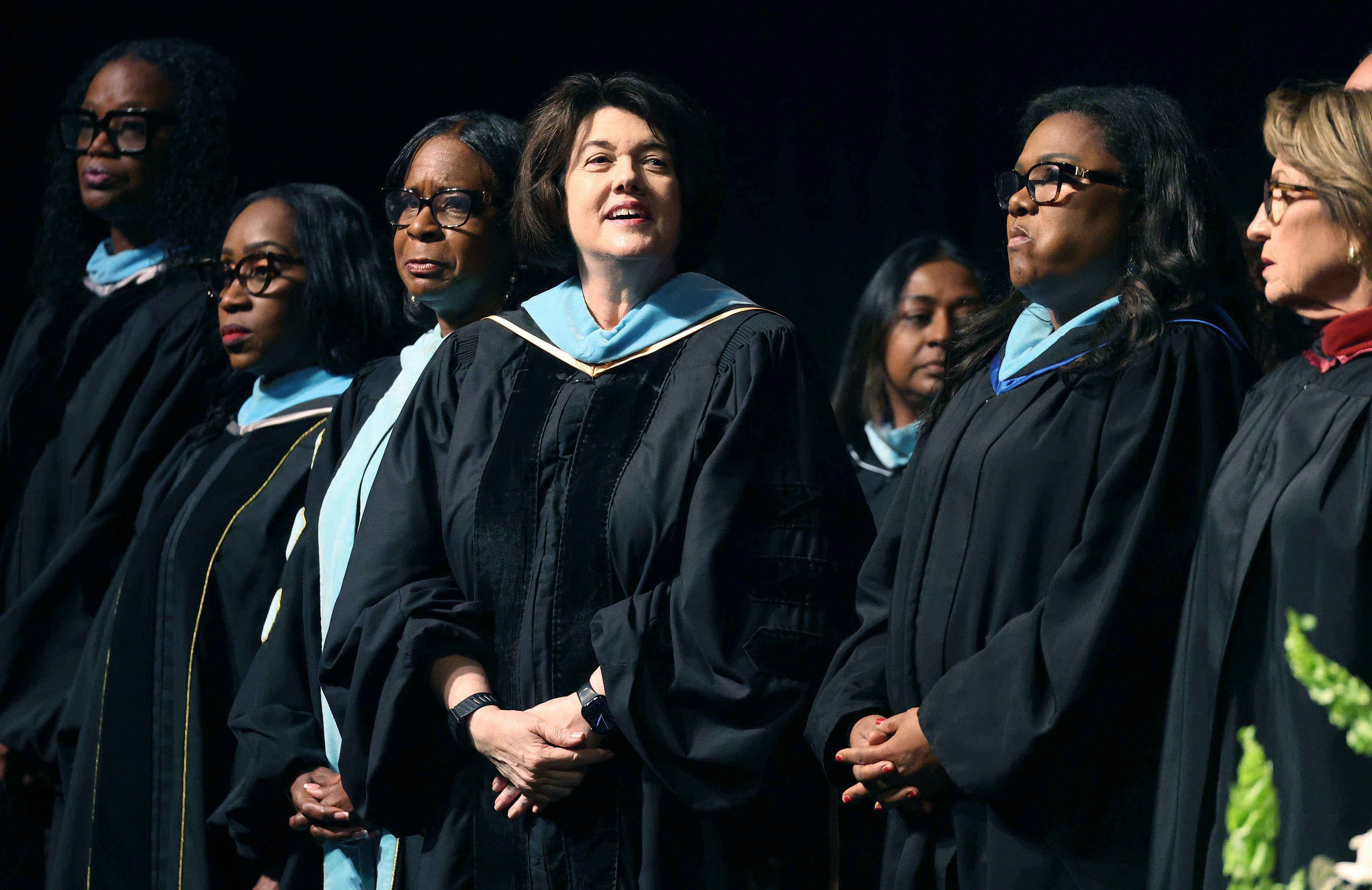 Orange County Schools Superintendent Dr. Maria Vazquez (middle) and other...