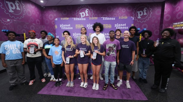 Orlando Magic guard Anthony Black appears with young area athletes at the Planet Fitness on Gore Street in Orlando to celebrate the start of Planet Fitness' High School Summer Pass program. Anthony's younger brother, Beckham Black, the No. 1 ranked high school guard in the country at Southeastern Prep, joined him for the event. (Stephen M. Dowell/Orlando Sentinel)