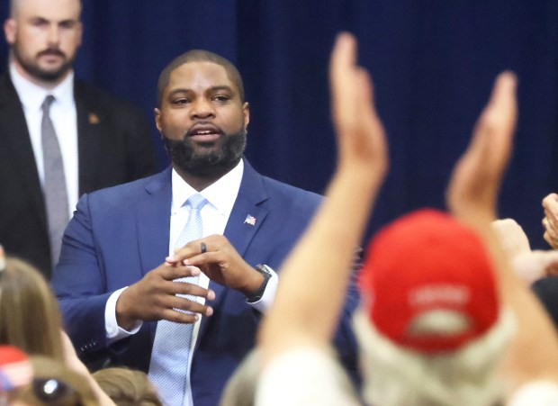 Florida Republican gubernatorial candidate and U.S. Congressman Byron Donalds responds to supporters during President Donald Trump's visit to The Villages, Fla., Friday, May 1, 2026. (Joe Burbank/Orlando Sentinel)