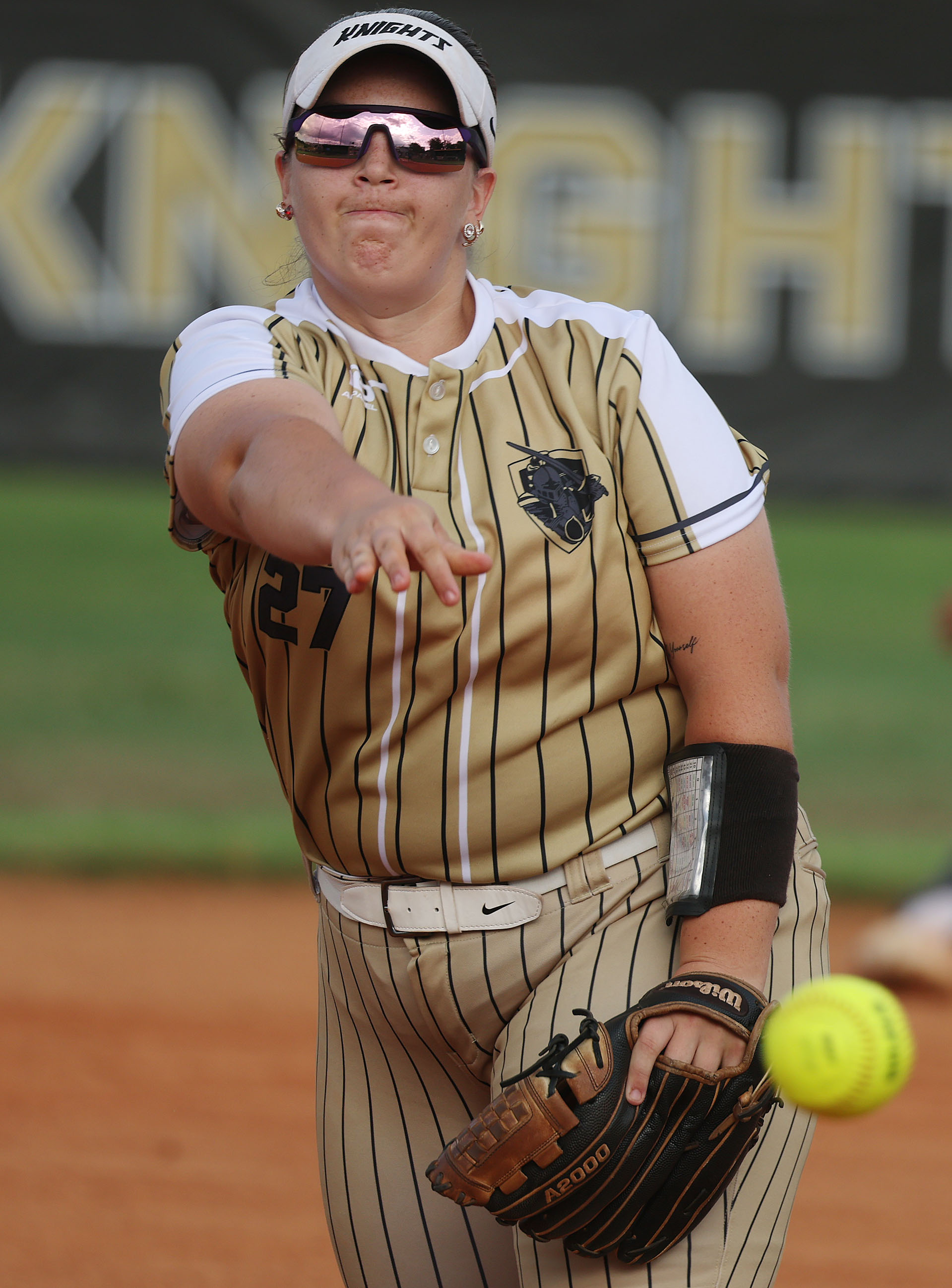 East Ridge High softball pitcher Simmone Hymiller throws during the...
