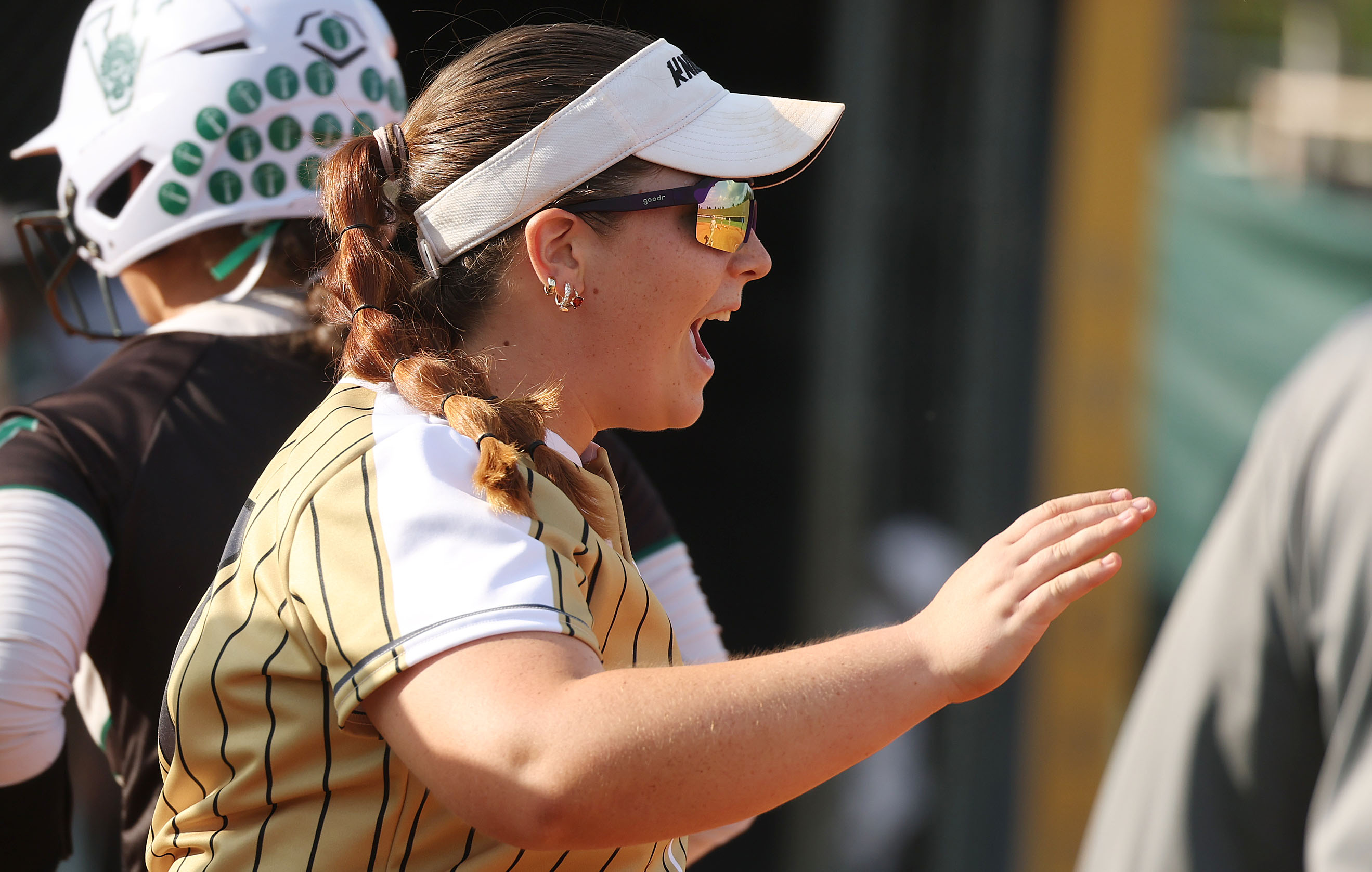 East Ridge High softball pitcher Simmone Hymiller celebrates during the...