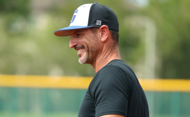 The Geneva School softball head coach Jared Incinelli smiles during a state semifinal game against The Master's Academy in Casselberry on Tuesday, May 13, 2025. (Stephen M. Dowell/Orlando Sentinel)