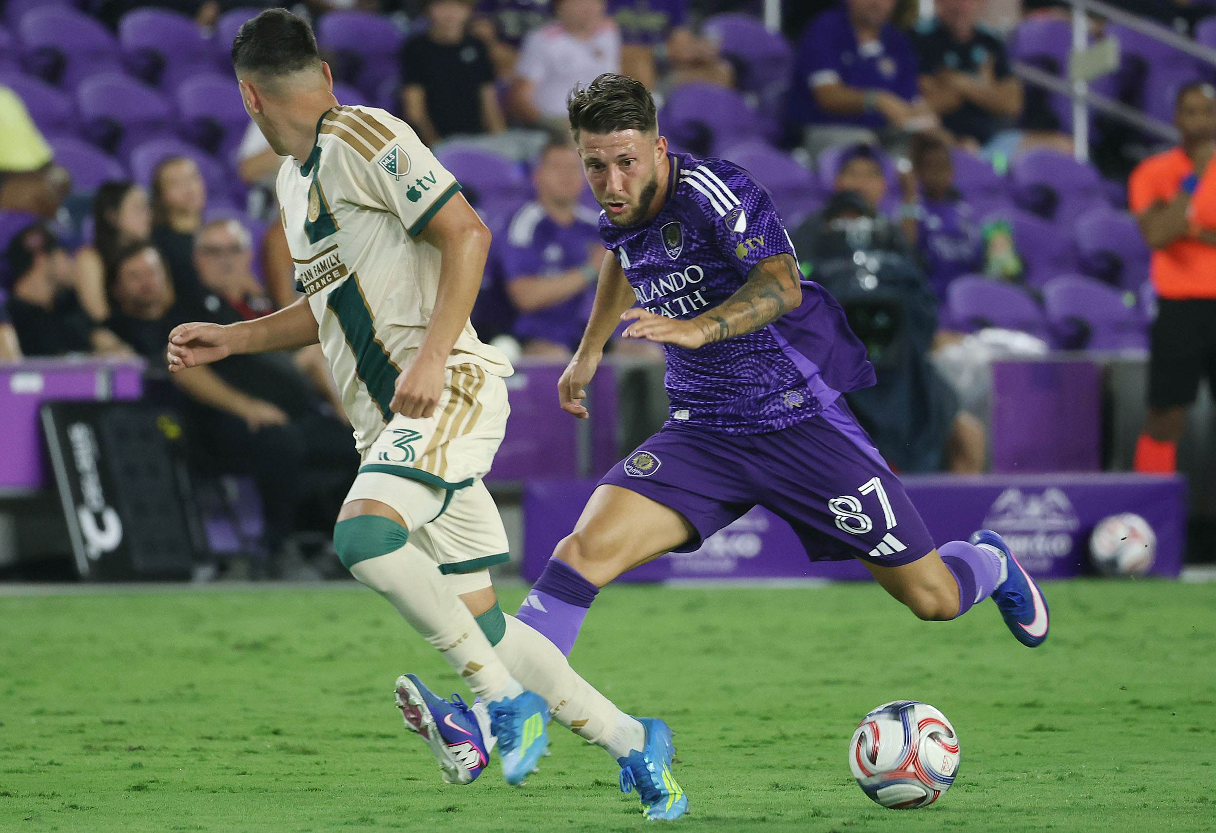 Orlando player Marco Pasalic (87) tries to get the ball...