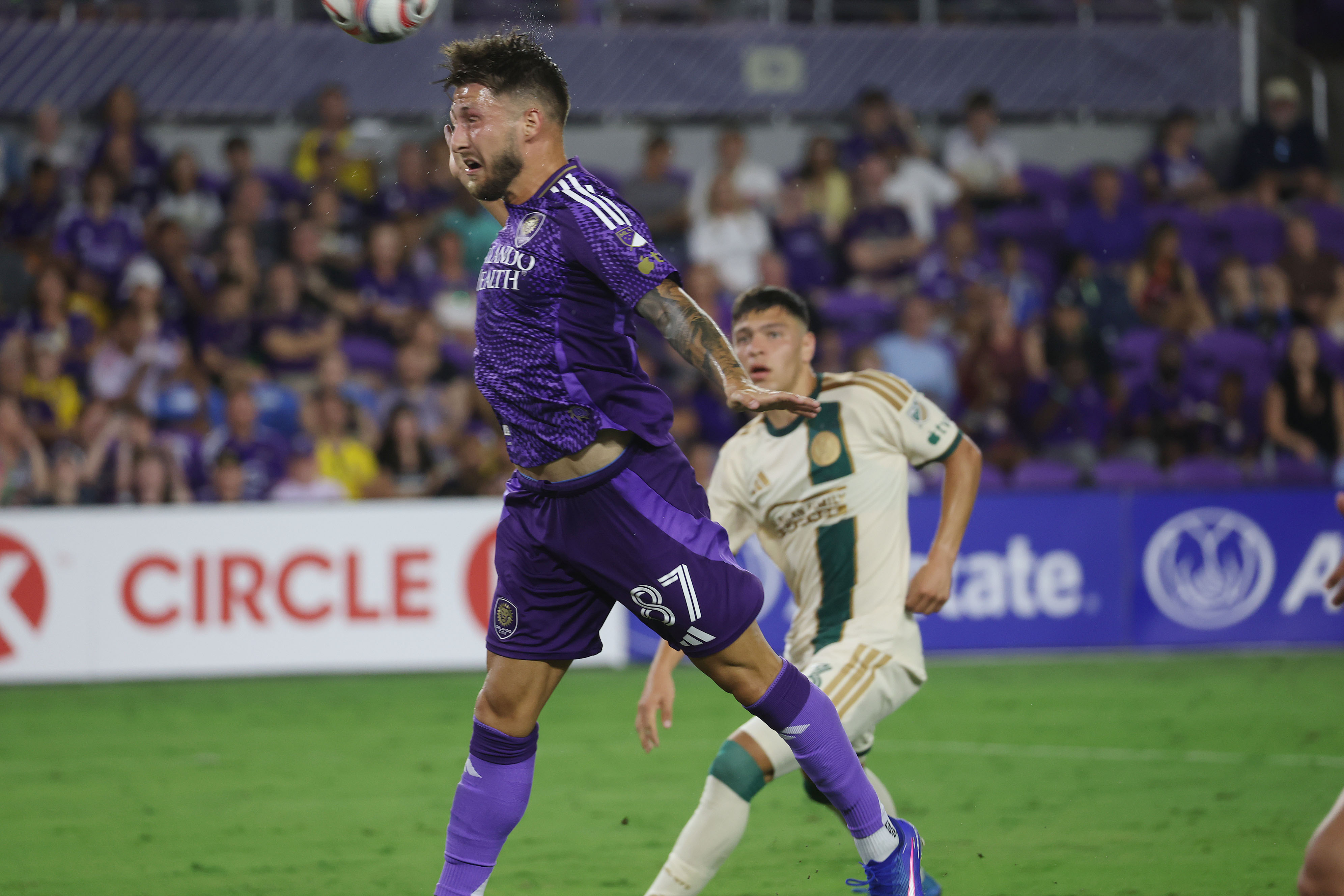 Orlando player Marco Pasalic (87) heads the ball during the...