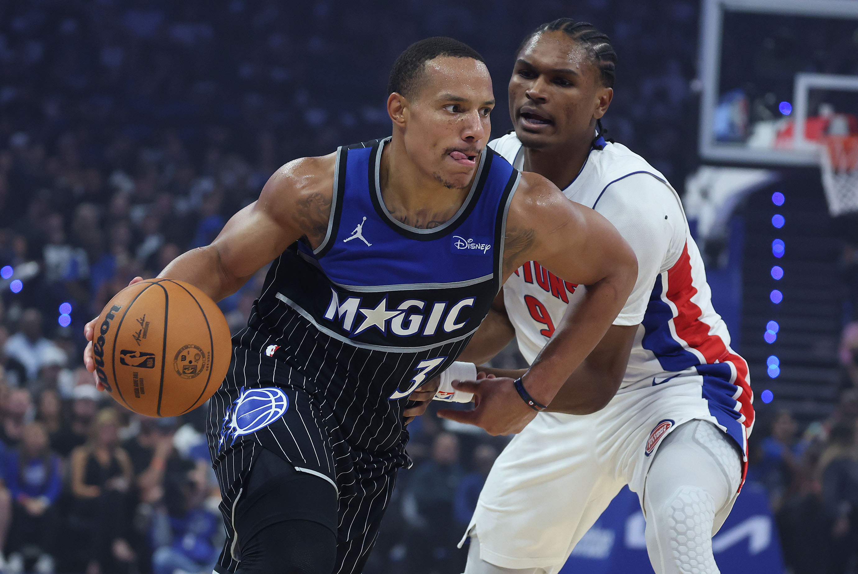 Orlando guard Desmond Bane (3) drives past Detroit forward Ausar...