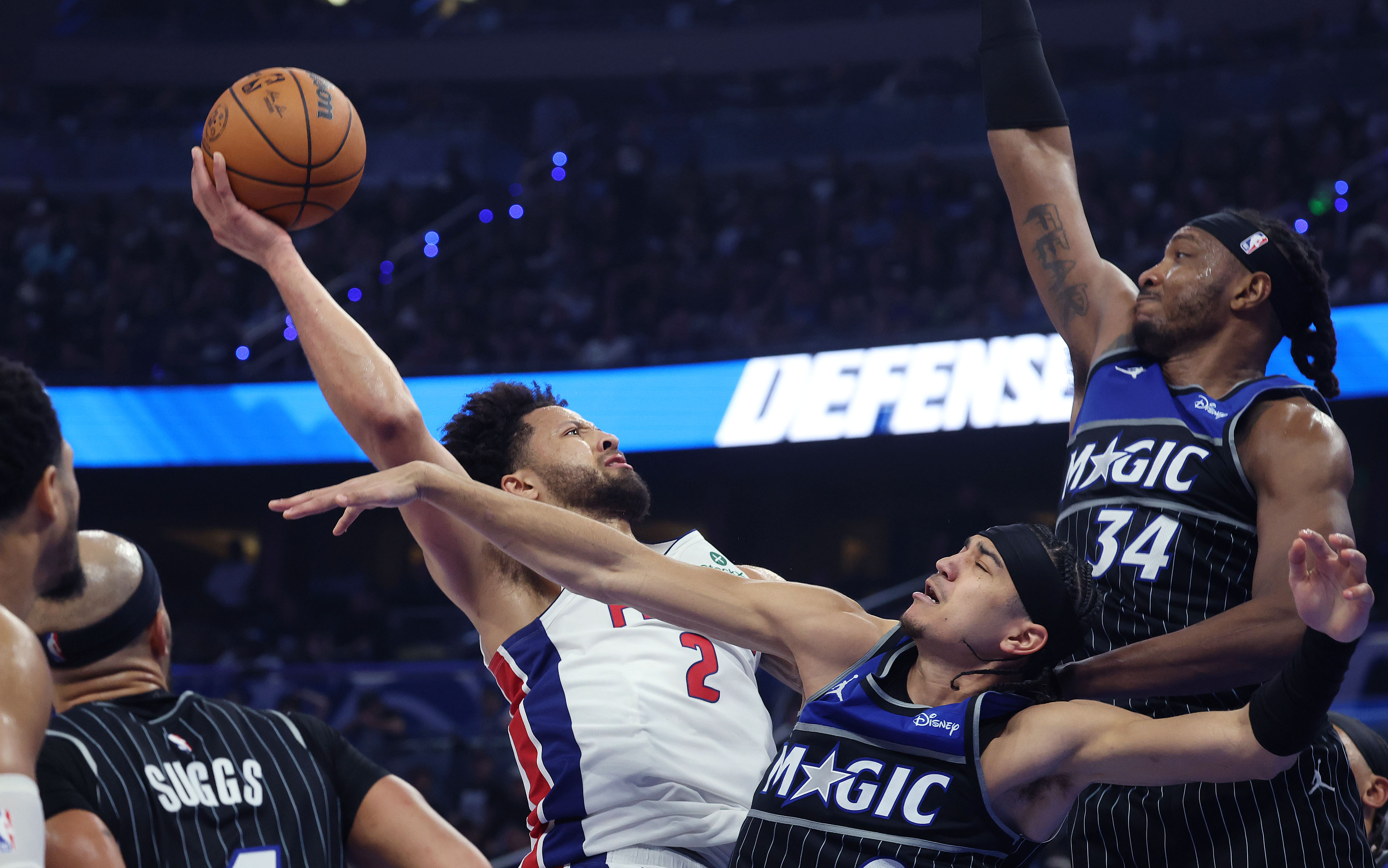 Detroit guard Cade Cunningham (2) shoots past Orlando guard Anthony...