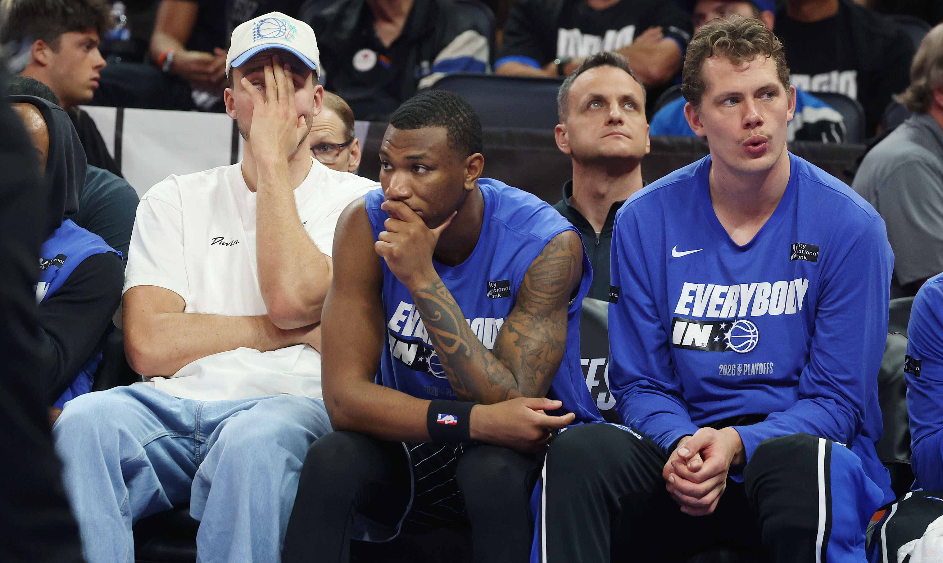 Orlando players, from left: Franz Wagner, Jamal Cain, and Mo...