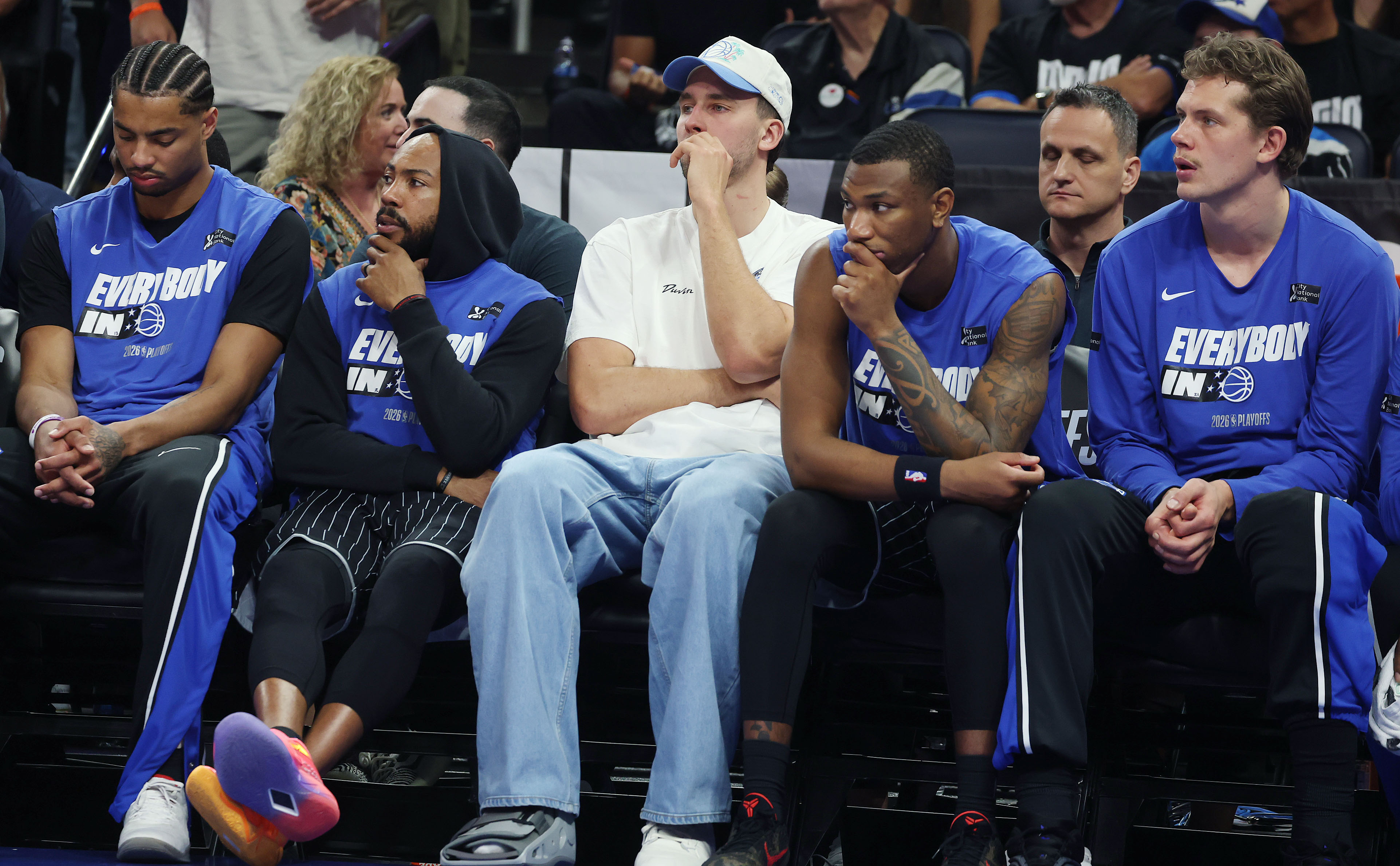 Orlando players are subdued on the bench during the Detroit...