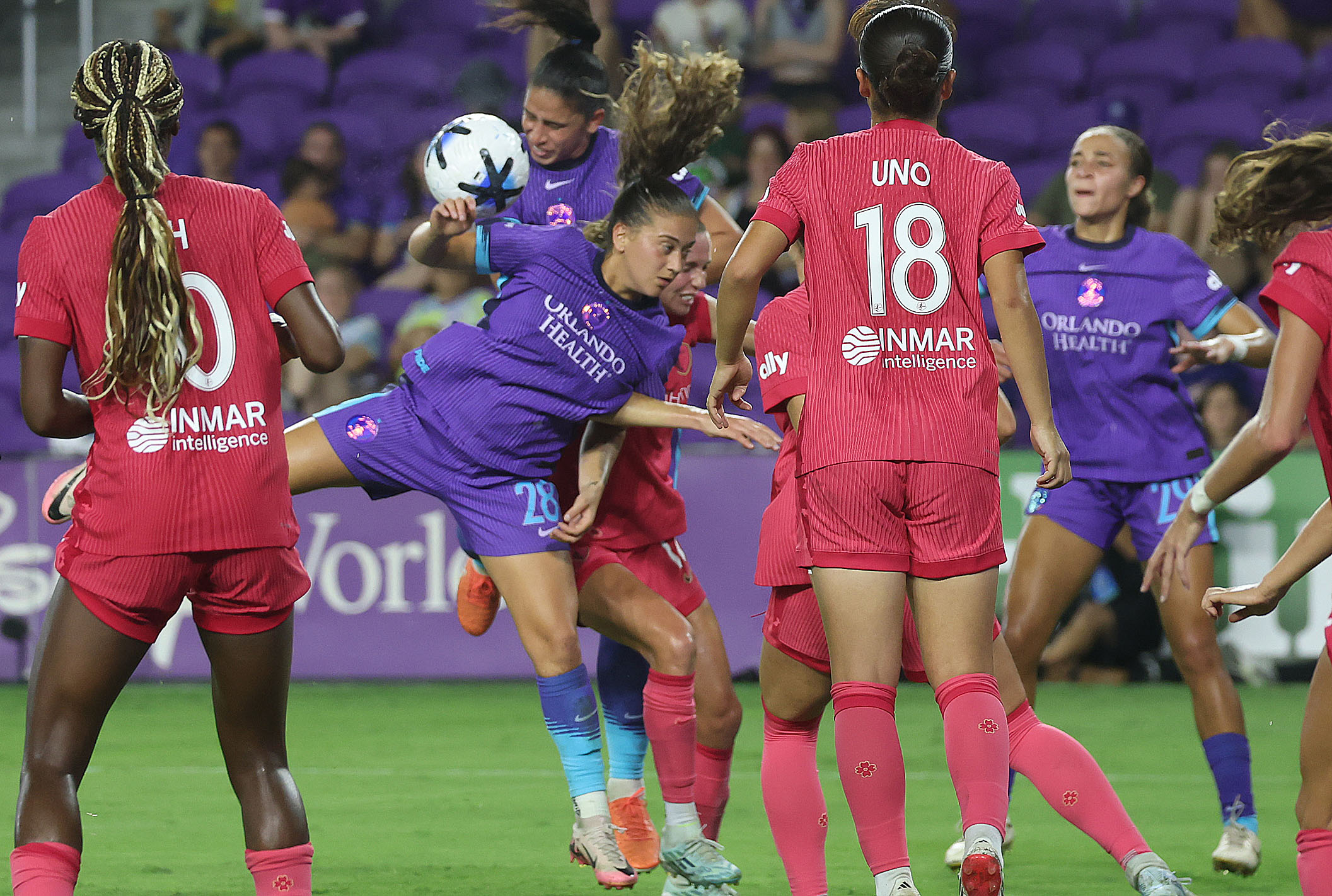 Orlando player Summer Yates (28) heads the ball during the...